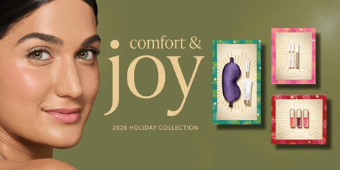Jane Iredale Comfort and Joy 2026 holiday collection: a model beside the Well Rested, Starry Eyed and Just Kissed gift boxes