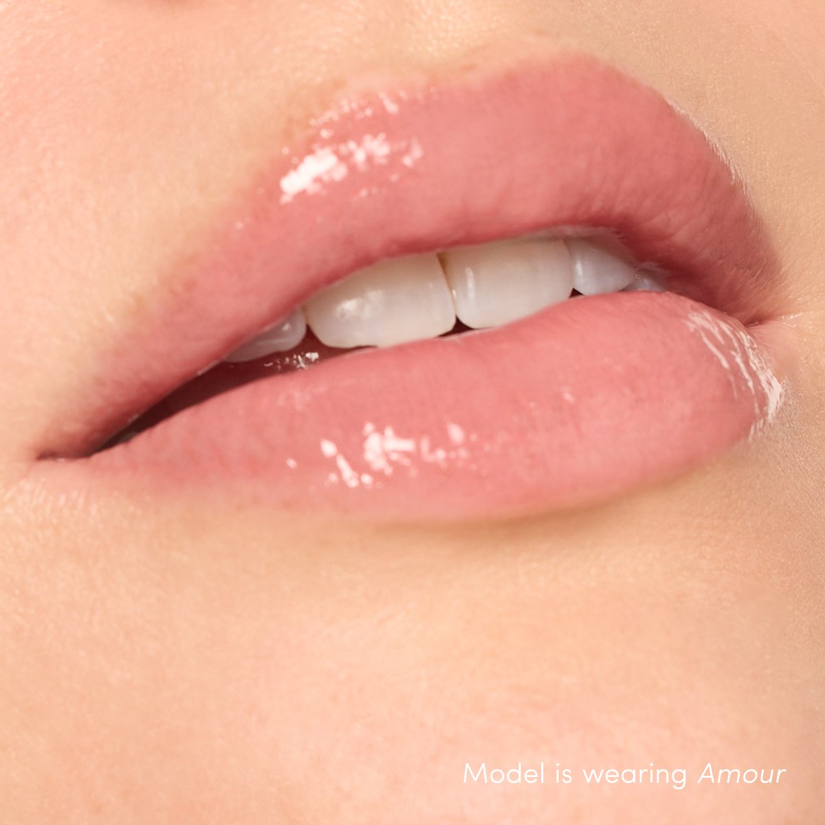 Jane Iredale ColorLuxe High Impact Lip Glaze, shade Amour, on lips