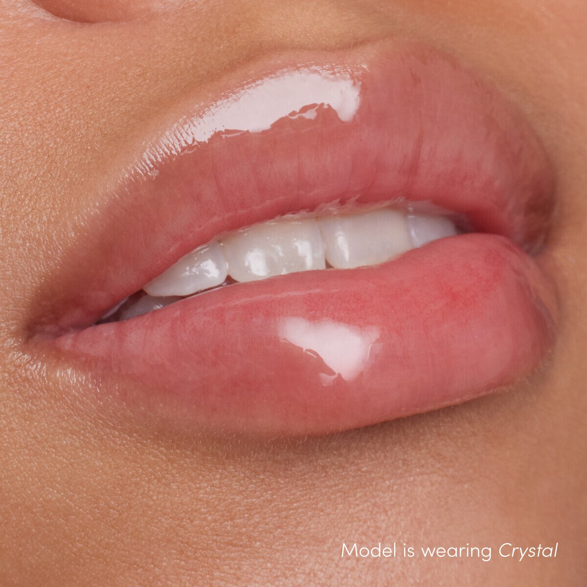 Jane Iredale ColorLuxe High Impact Lip Glaze, shade Crystal, on lips