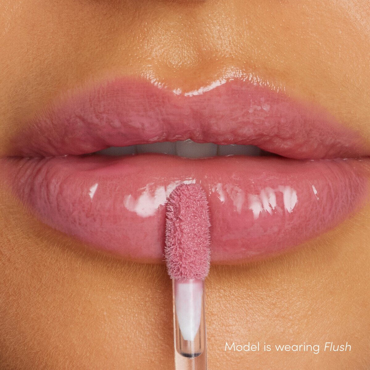 Jane Iredale ColorLuxe High Impact Lip Glaze, shade Flush, on lips