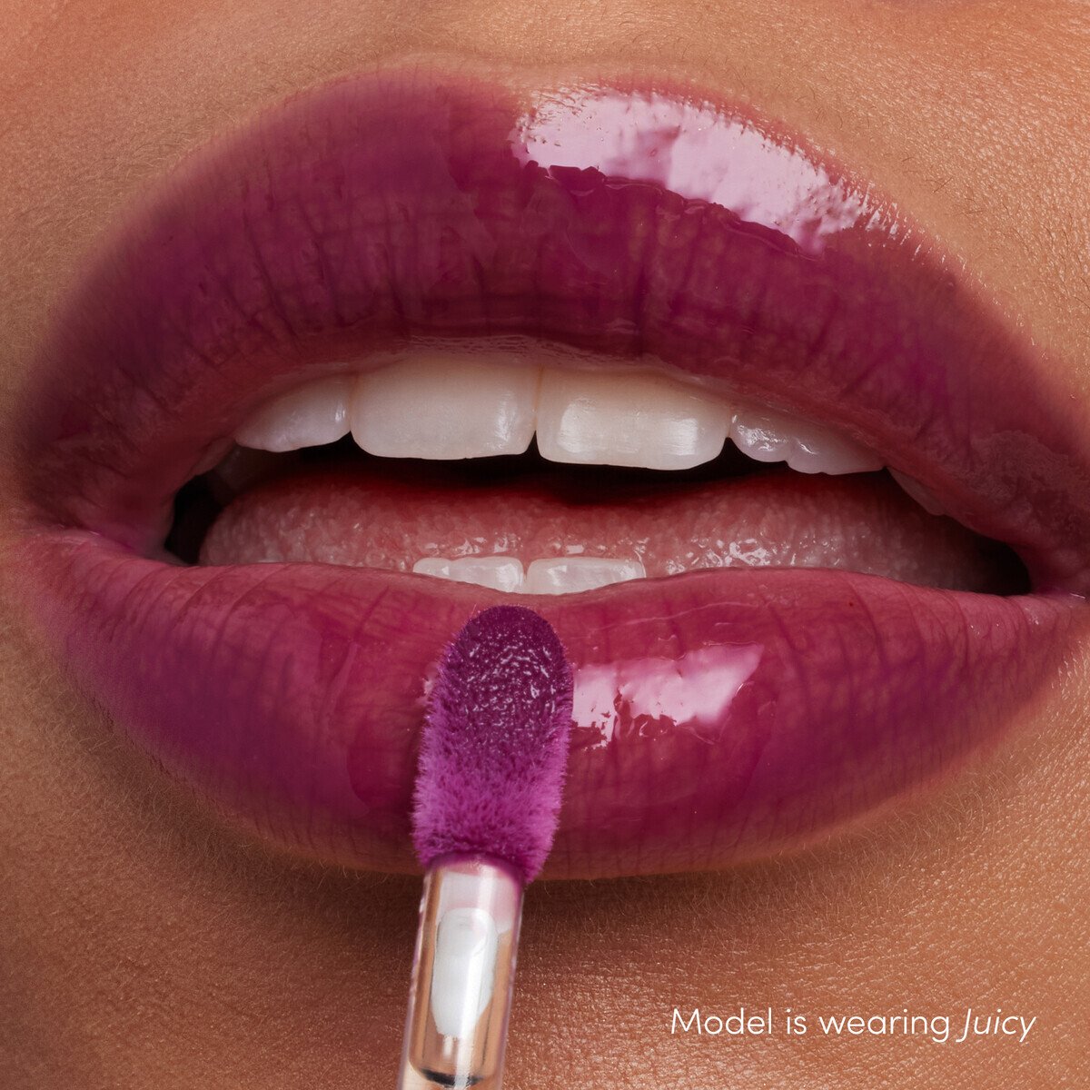 Jane Iredale ColorLuxe High Impact Lip Glaze, shade Juicy, on lips