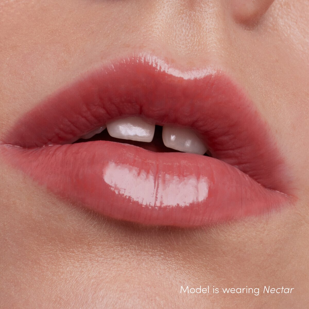 Jane Iredale ColorLuxe High Impact Lip Glaze, shade Nectar, on lips