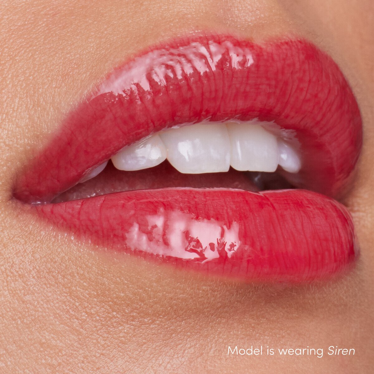 Jane Iredale ColorLuxe High Impact Lip Glaze, shade Siren, on lips